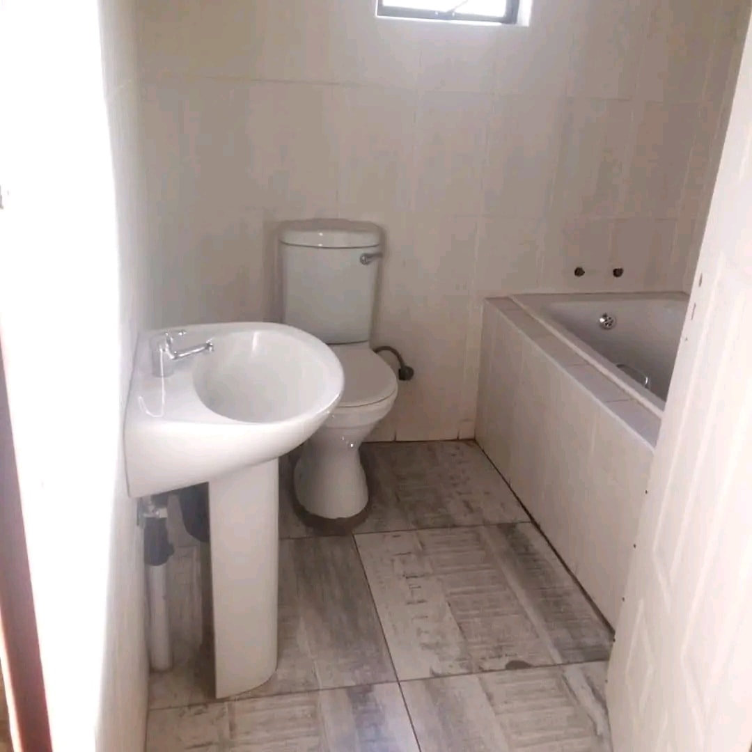 Kitchen, single garage, sitting room, bedrooms 